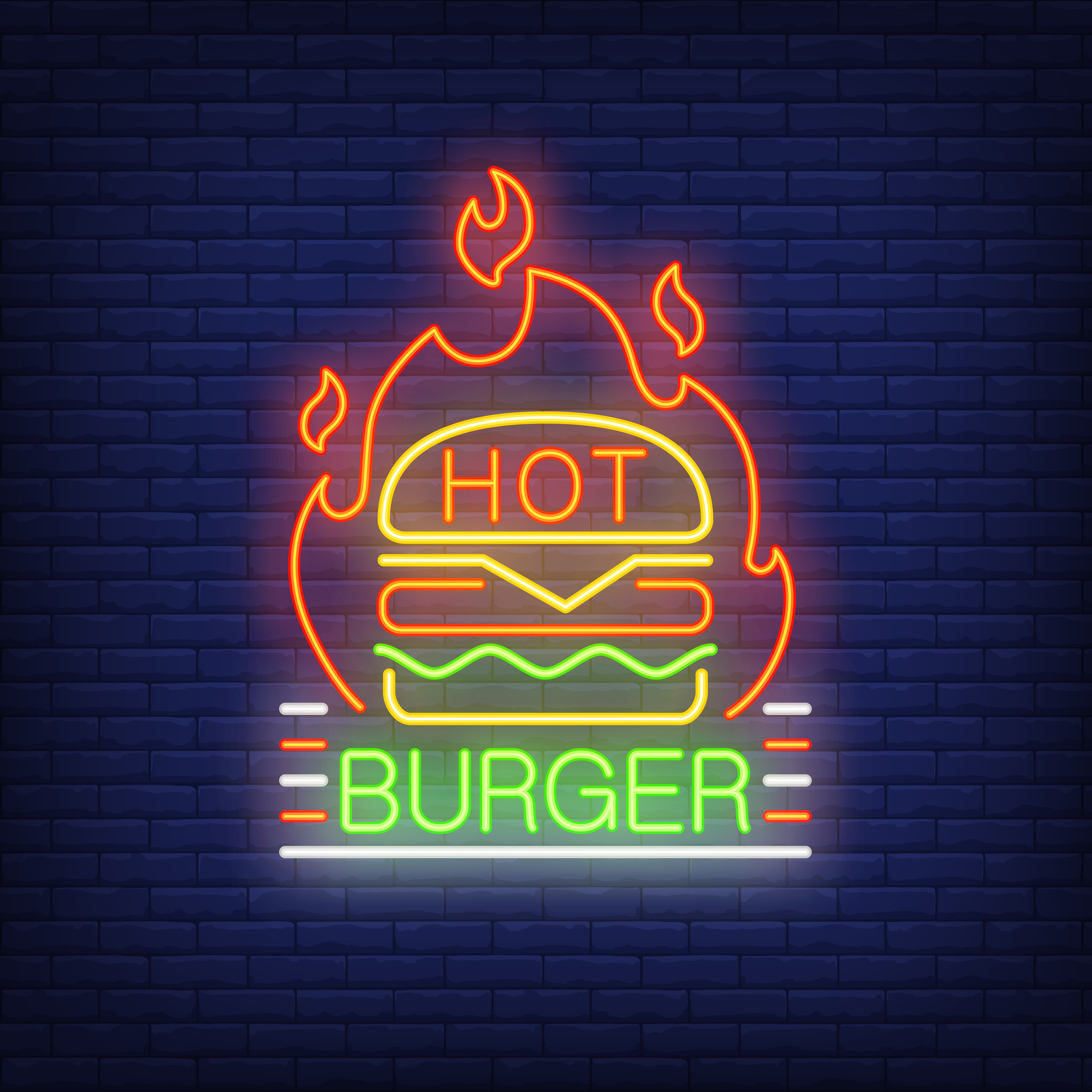 Hot burger neon sign hamburger and fire shape on brick wall background